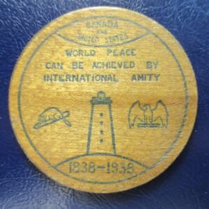 CANADA ESTADOS UNIDOS 1938 FICHA 5 CENTS 100 AÑOS DE PAZ EN LAS FRONTERAS MADERA