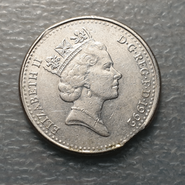 ERROR GRAN BRETAÑA GREAT BRITAIN 10 PENCE 1992 FALTA DE METAL FINAL DEL LISTEL - Imagen 2