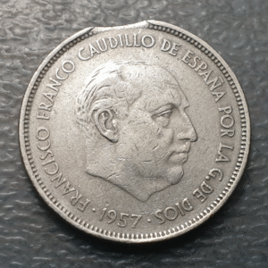 ERROR ESTADO ESPAÑOL 25 PESETAS 1957 (70) FALTA DE METAL - FINAL DEL LISTEL